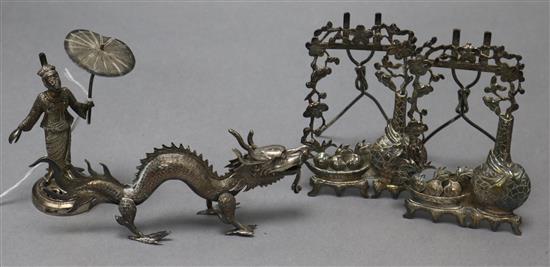 Three Chinese white metal menu holders, including a dragon and pair of frames and a similar Siam menu holder.